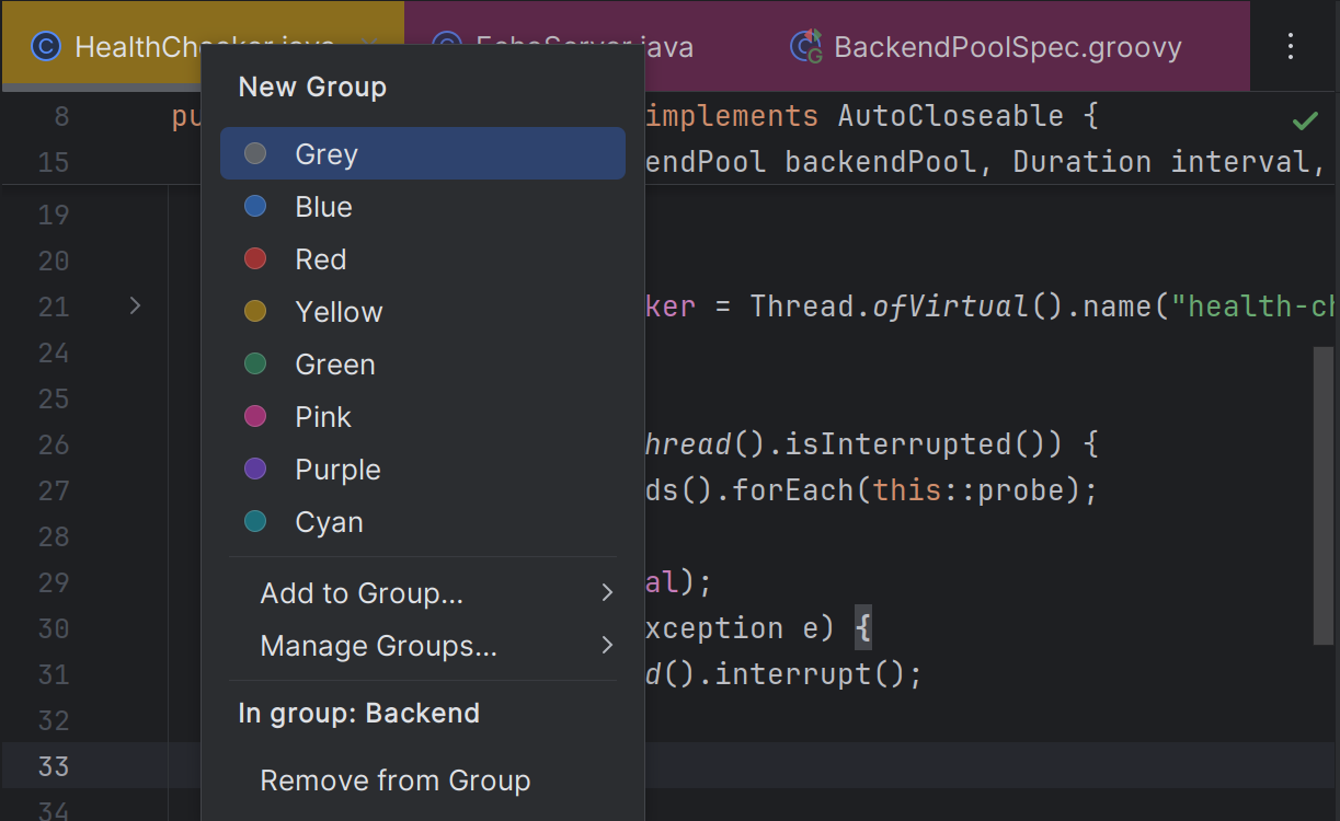The right-click menu open on an editor tab, showing the New Group colour swatches — Grey, Blue, Red, Yellow, Green, Pink, Purple, Cyan — above Add to Group, Manage Groups and Remove from Group.